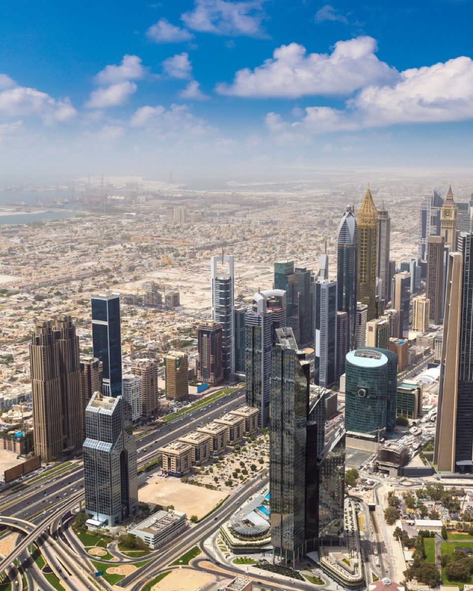 Aerial view of Dubai cityscape — Shams-al-Qaswa's service territory